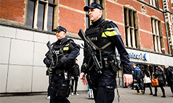 Armed police at Amsterdam central station after the attacks in Brussels in 2016. Photo: ANP 